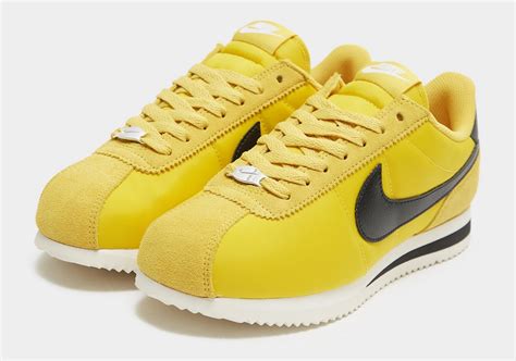 nike cortez yellow and black